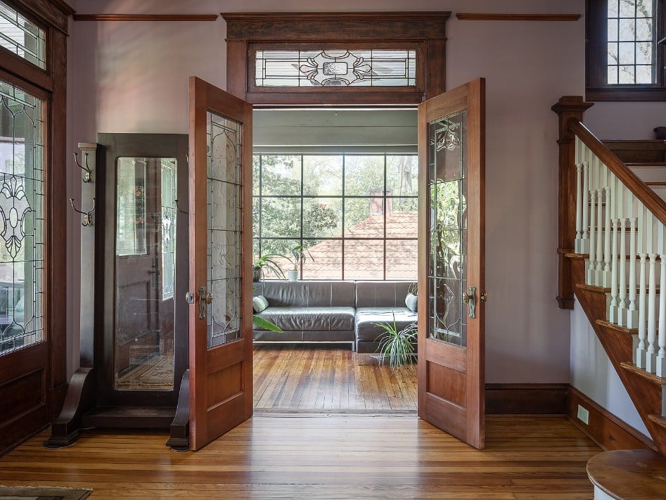 Historic home sunroom entry doors with leaded glass.