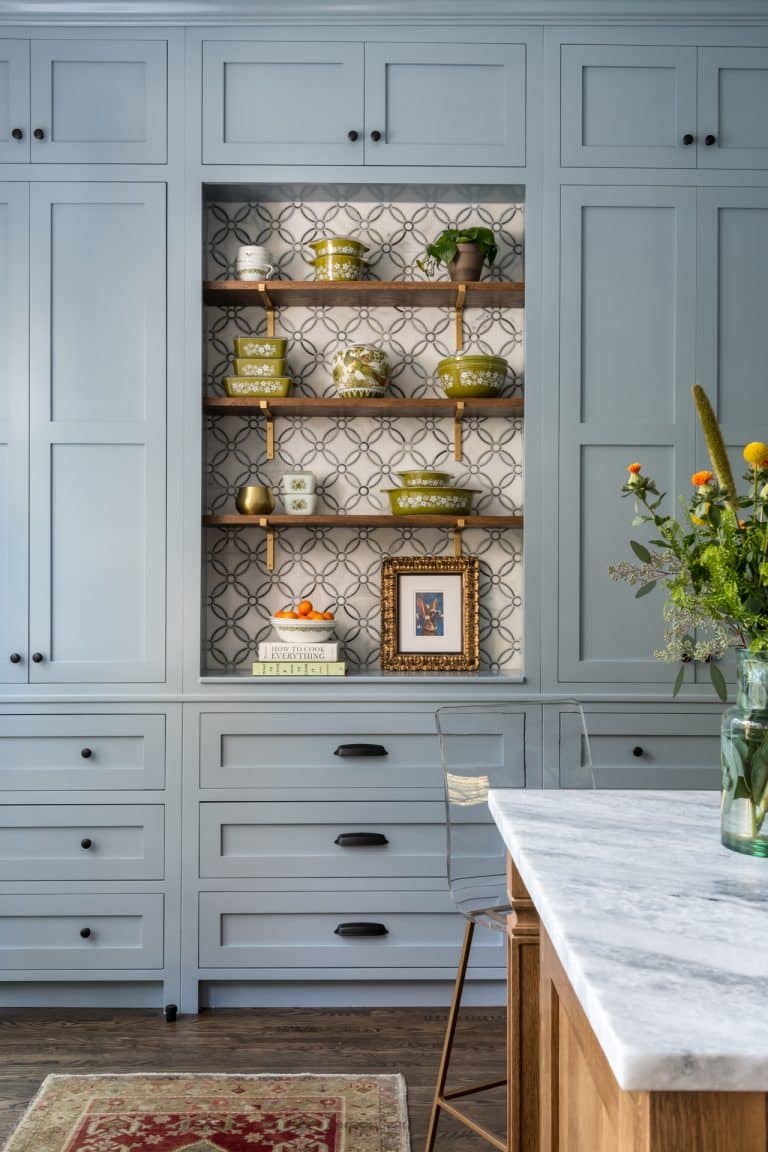 Kitchen with blue built in cabinets